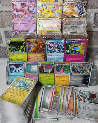 Kit con oltre 120 carte pokemon + carte speciali