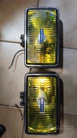 Fari Carello gialli profondità 