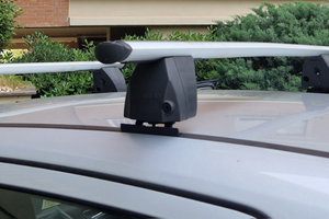 Barre da tetto portatutto Menabo