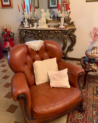 Divani in pelle e mogano intarsiato