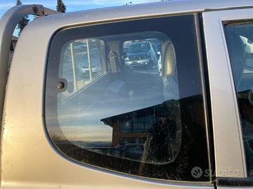 VETRO APRIBILE POST. DESTRO L200 K64T 2001