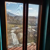 infissi in legno , doppio infisso alluminio 