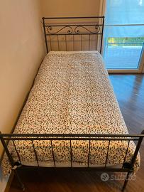 Letto in ferro battuto con rete, Cantori