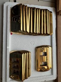 Placche per interruttori in ottone pieno e bruniti