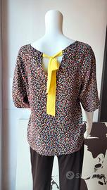 Blusa con fiocco giallo 