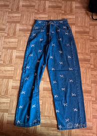 jeans con fiocchetti