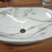 lavabo da appoggio con miscelatore 