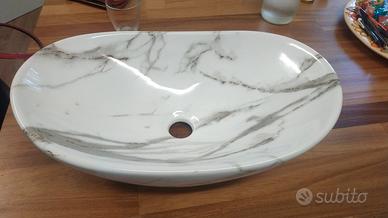 lavabo da appoggio con miscelatore 