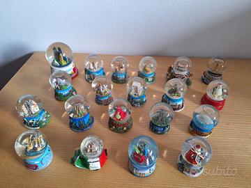 Palle innevate di varie città e soggetti