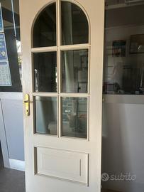 Porta interna in legno massello con vetro