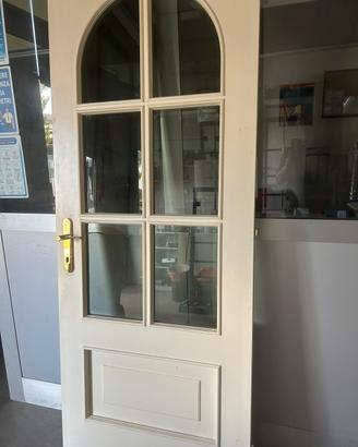 Porta interna in legno massello con vetro