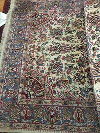 Tappeto persiano annodato a mano 195 per 305 cm.