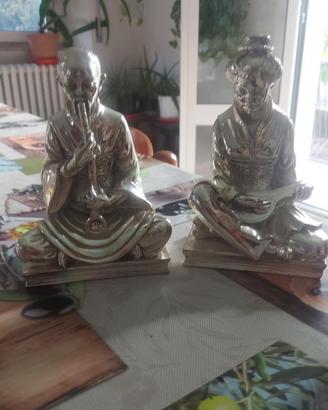 2 x Statue orientali laminato argento