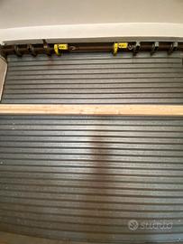Saracinesche  con motore elettrico per garage acci