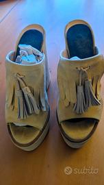 sandali sabot con frange e tacco a blocco in pelle