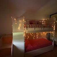 Struttura letto a castello multifunzionale