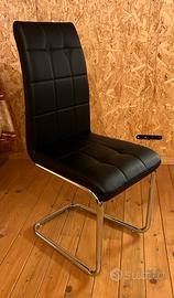 4 Sedie nere in ecopelle – buono stato