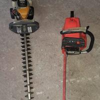 Motosega rossa e taglia siepe