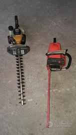 Motosega rossa e taglia siepe