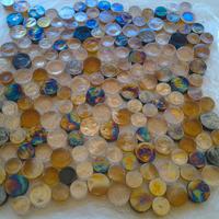 mosaici  artigianali come inserti da pavimento