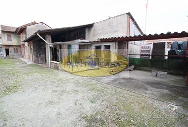 Abitazione con negozio