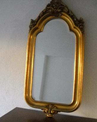 Specchiera con cornice in legno dorato