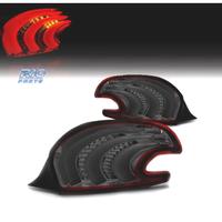 FANALI PER PEUGEOT 208 12-15 LIGHT BAR ROSSO FUMÉ