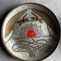 Coppia di piatti decorativi in ottone