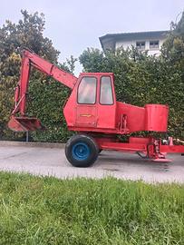 ragno carica letame e legna 