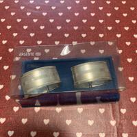 Coppia di anelli portatovaglioli in argento 800