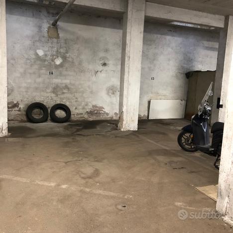 Posto auto doppio + moto garage chiuso