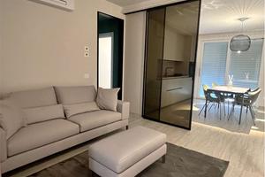 APPARTAMENTO NUOVO con CORTE E GARAGE