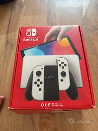 Nintendo switch oled + scatola + giochi + controll