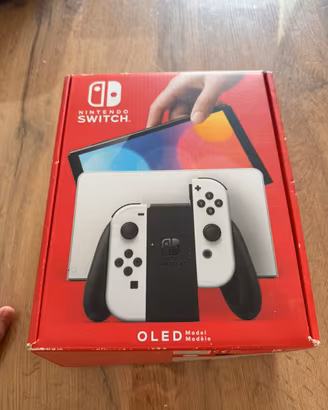 Nintendo switch oled + scatola + giochi + controll