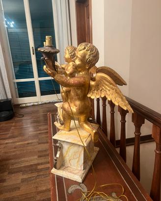 Coppia di angeli cerifori barocchi dorati