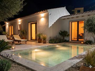 Villa con_vista mare_e_piscina dal_costrutture