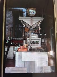 Cucina Arclinea in acciaio con isola centrale