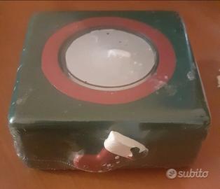 Portacandela con candela in ceramica. Sigillata.