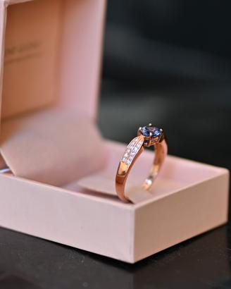 Anello tanzanite blu da 0,80 ct e diamante rosa...