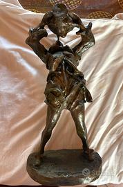 Scultura Ragazzo che Beve