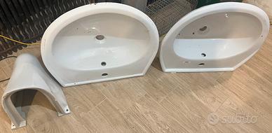 Lavelli da bagno nuovi con una relativa mezza colo