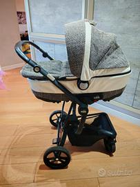 Carrozzina  "Trio  Cam "