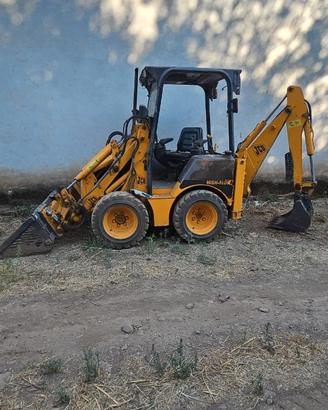Mini terna JCB 1CX HF targata con trincia e benne