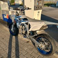 TM  125