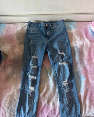 jeans skinny  blu con strappi