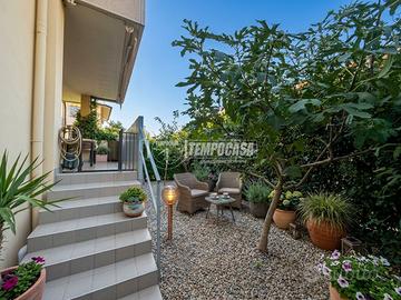 Trilocale con giardino e terrazzo