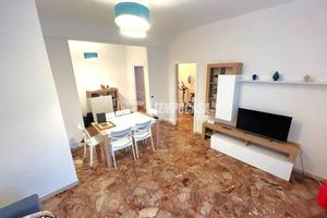 TRILOCALE CON STUDIO E BALCONE