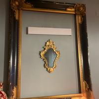 Cornice veneziana in  legno.