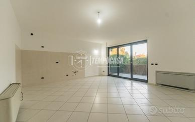 Bilocale con giardino privato, terrazzo e box dopp