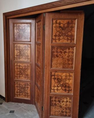 Porte in legno intarsiato
